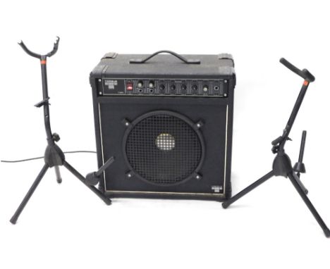 A Torque T 50k amplifier, with front grill speaker 53cm high 48cm wide 27cm deep.