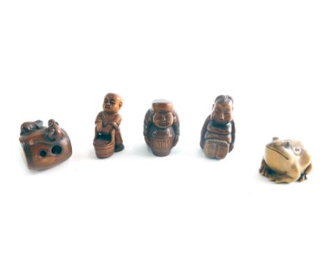 Various Japanese 20thC carved wooden Netsuke, to include large figure holding barrel, 5cm high, a seated child, mice and barr