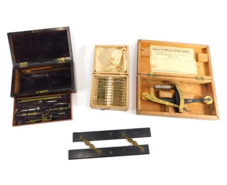 Various optician aids, spectacle lenses, an RAF tautness meter, partially cased, and a mahogany bone handled part geometry se
