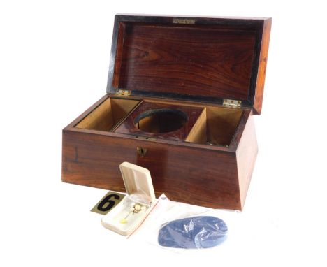 A 19thC rosewood sarcophagus shaped tea caddy, the hinged lid revealing a part fitted interior, with space for mixing bowl, 3