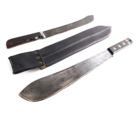 A 20thC military machete, marked Martindale, with crocodile emblem, with leather scabbard, shaped blade and part studded hand