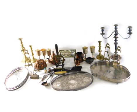 A silver plated three branch candelabrum, 49cm high, brass candlestick, trivet, various copperware, reproduction jelly mould,