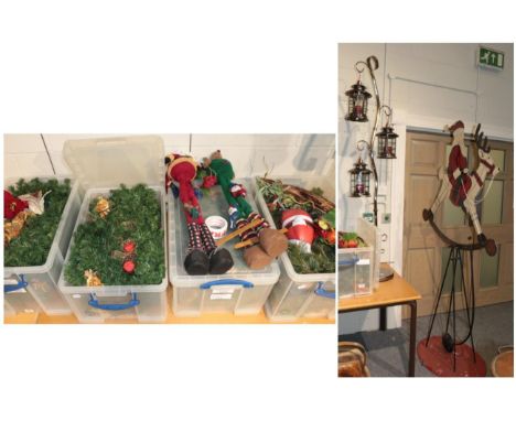 ^ A quantity of Christmas decorations in four boxes; together with a modern chromed freestanding lamp with three lanterns 