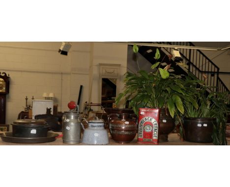 ^ A quantity of kitchenalia to include copper kettle; enamel porridge pan; brass and copper planters etc 