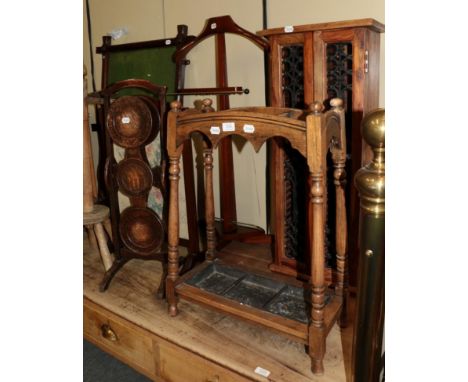 ^ A quantity of occasional furniture to include: an oak three-division stick stand; a reproduction hardwood CD cabinet; repro