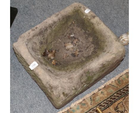 A small stone trough, 41cm wide 