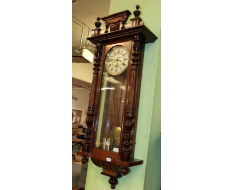^ A Vienna type double weight driven striking wall clock, dial signed G.B for Gustav Becker 