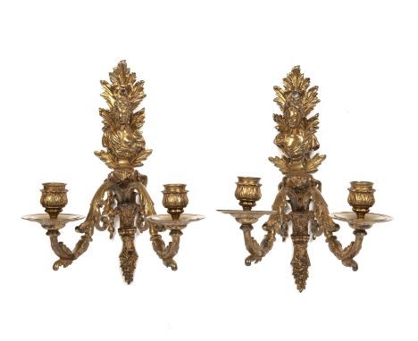 Pair of Regence wall lights French, 19th Century, in the form of scrolling flowers and foliage, with two candlestick holders,