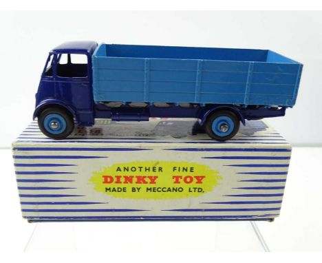 A DINKY 911 Guy 4-Ton Lorry, 2nd Style Cab - in light / mid blue - G in G box with export label