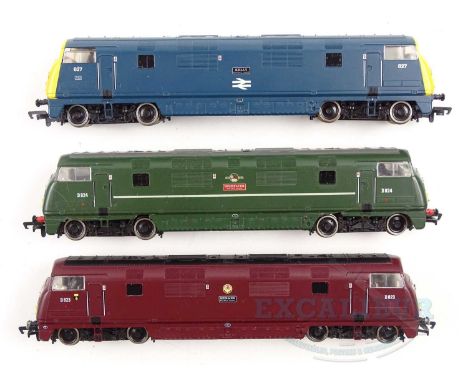 A group of MAINLINE OO gauge Warship class diesel locomotives comprising 'Kelly', 'Highflyer', and 'Hermes' in BR blue, green