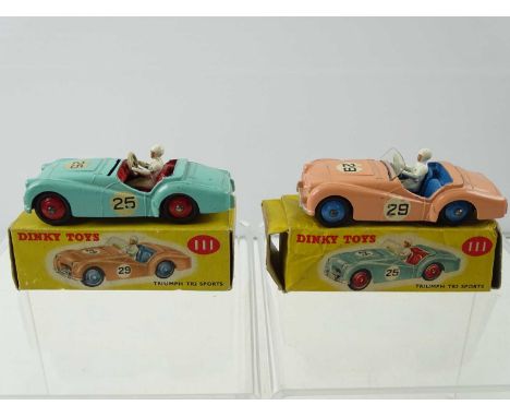 A pair of DINKY 111 Triumph TR2 Sport cars - one in salmon one in turquoise - G (one missing windscreen) in F/G boxes (2)