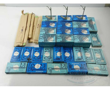 A large quantity of boxed MARKLIN HO gauge catenary components - VG in G/VG boxes (Q)