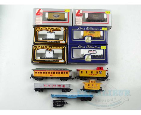 A group of OO gauge wagons by LIMA and MAINLINE together with a small group of unboxed HO gauge American Outline wagons - G/V