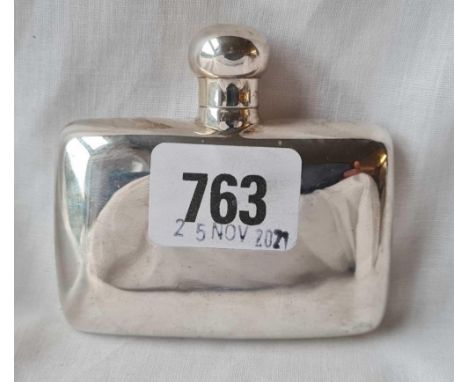 A small hip flask of cover outline, screw on cover, 3" wide, probably Chester 1908, w.46g