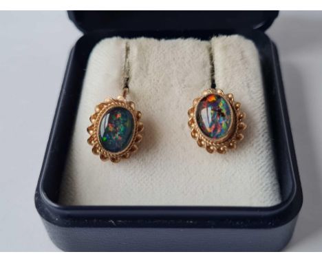 A pair of gold and opal doublet earrings boxed 9ct 