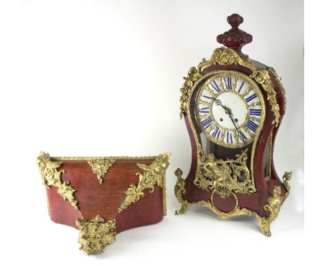 A Louis XIV style gilt metal mounted bracket clock, 19th Century, the white enamel dial with Roman numerals in blue with conf