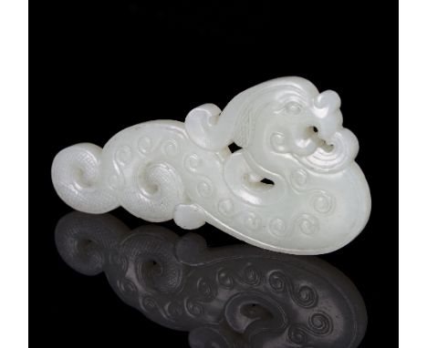A Chinese white jade phoenix pendant, carved to either side, 8.5cm long/see illustration   Condition Report:  One slight inde