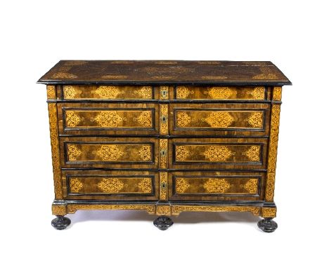 A Maltese marquetry commode, the top inlaid a shaped cartouche with stag and hound in foliage within scrolling boxwood lines 