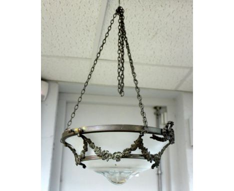 An early 20th Century glass pendant ceiling light shade with bronze swags and garlands of flowers, 37cm diameter