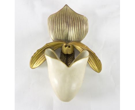 A Royal Worcester wall pocket, modelled as an orchid, 20cm high   Condition Report:  Small flat chip to front right side of t