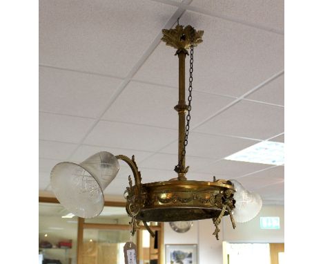 A gilt brass pendant ceiling lamp set two lights with glass shades and ribbon tie borders, 67cm high