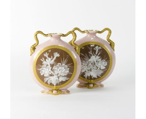 A pair of Grainger's Worcester moon vases with entwined handles and highlighted in gilt, 17cm high/see illustration   Conditi