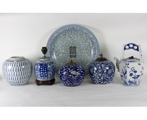 A 20th Century Chinese blue and white charger, 51cm diameter and sundry Chinese blue and white jars, some converted as lamps 