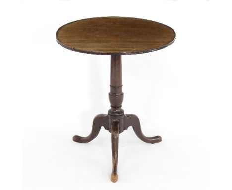 A George III mahogany tripod table, the circular top 59.5cm diameter
