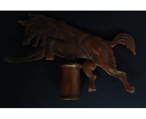 A late 19th/early 20th Century brass Friendly Society type staff finial of a wolf
