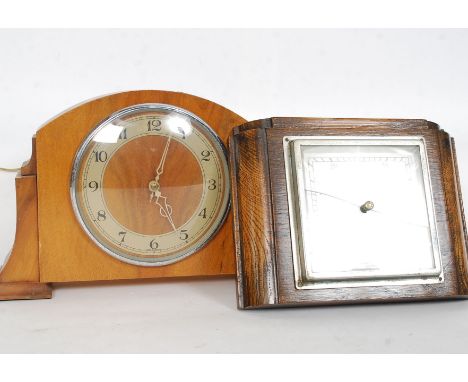 A 1930's Art Deco walnut mantel clock together with a Walker & Hall aneroid silver faced and oak cased barometer