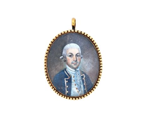 A gold mounted oval portrait miniature pendant, designed as the portrait of a gentleman wearing a blue jacket, having gilt bu