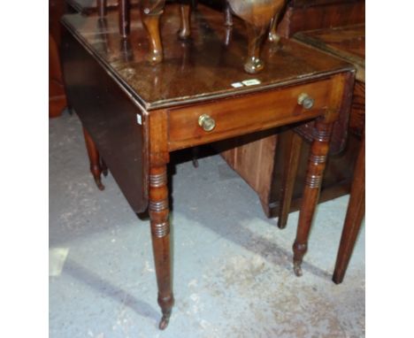 A Victorian mahogany Pembroke table, on ring turned tapering supports, 83cm wide x 72cm high.