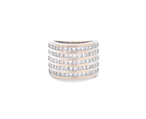 A white gold and diamond set half hoop ring, mounted with five rows of princess cut diamonds, detailed 750, ring size J, the 