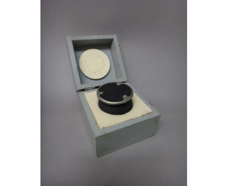 A vintage 'Ball & Biscuit' 4021 type microphone, by Standard Telephones & Cables Ltd, boxed.  Illustrated