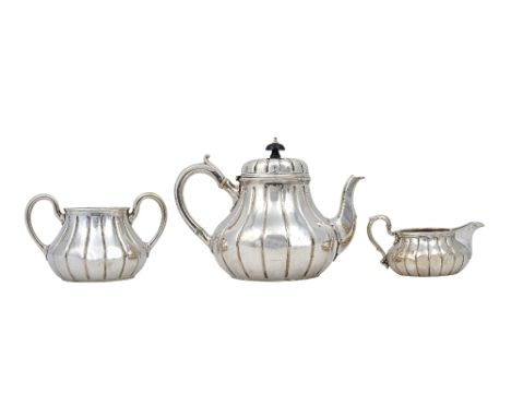 A silver composite three piece tea set, each piece of squat circular form, with fluted decoration, the teapot and the twin ha