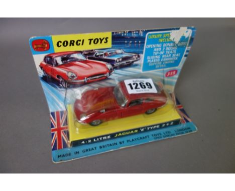 A Corgi 335 4.2 litre Jaguar 'E' type 2 + 2 (red), bubble boxed.