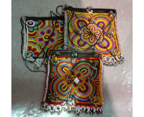 Textiles, including; a quantity of mainly 20th century African and Asian bead work textiles and other items, (qty). 