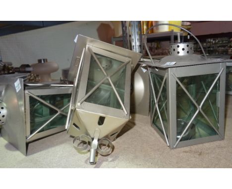 A quantity of 20th century metal and glass lantern style tea light holders, (qty). 
