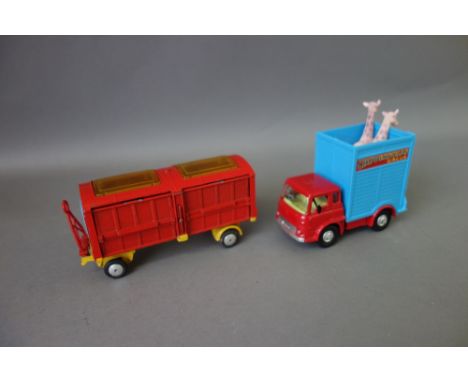 A Corgi 503 Chipperfields Circus giraffe transporter and a Corgi 1123 Chipperfields circus animal cage, both boxed, (2).  Ill