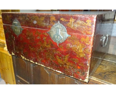 An early 20th century red lacquer chinoiserie decorated trunk, 98cm wide x 48cm high.