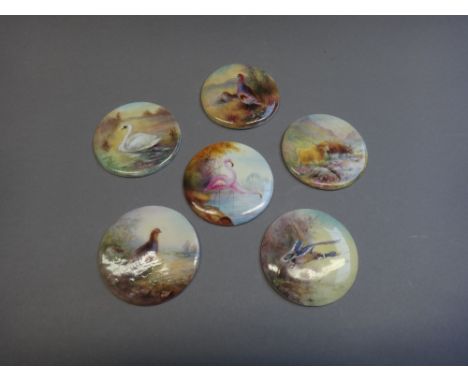 Five Royal Worcester circular plaques by James Stinton, circa 1920, depicting; grouse, duck, swan, game birds and highland ca