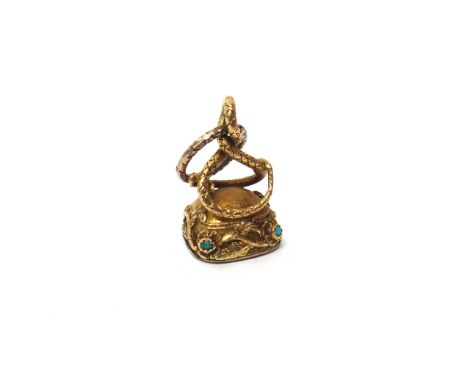 A Victorian two colour gold and turquoise set fob seal, with a serpentine motif to the top, the two colour gold foliate borde