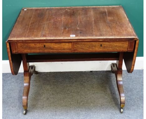 A Regency pollard oak banded rosewood sofa table, with a pair of frieze drawers on four downswept supports, 89cm wide across 