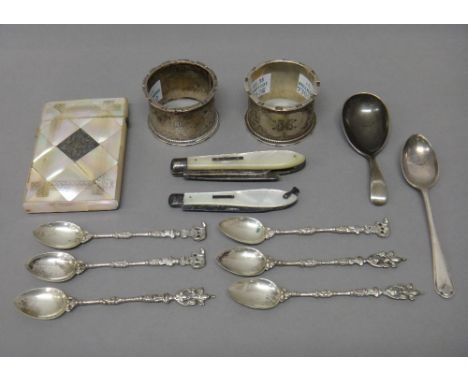 Silver and silver mounted wares, comprising; a pair of napkin rings, with engraved decoration, Birmingham 1908, a mother of p