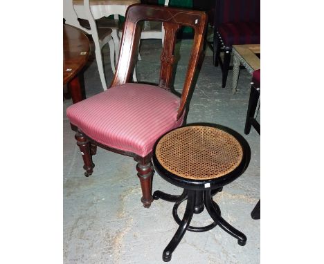 A Victorian ebonised Piano stool on four outswept supports, 38cm wide x 42cm high and a pair of Victorian mahogany hall chair