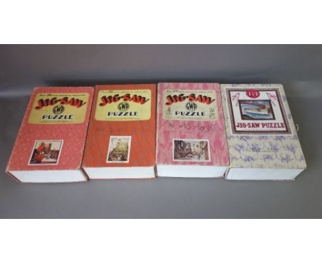 Five GWR vintage wooden jigsaw puzzles, comprising; Windsor Castle from the air, Historic Totnes, The Romans at Caerleon, Win