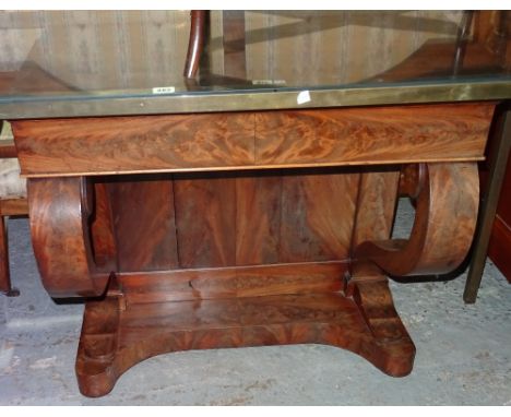 A 19th century Dutch mahogany console table, on sabre supports united by platform undertier, 82cm wide x 75cm high.