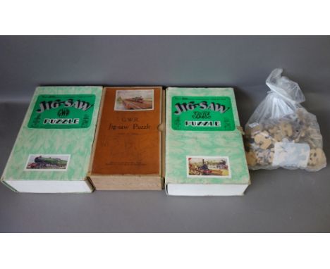 Five GWR vintage wooden jigsaw puzzles of railway interest, comprising; 'King George V', 'Locomotives Old and New', 'The Chel