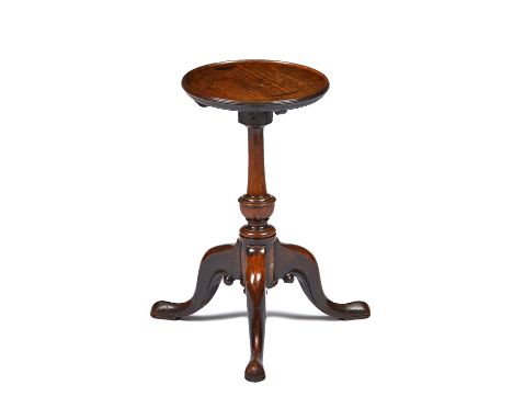 A George III mahogany kettle stand, the dished circular top on tripod base, the top 25cm wide x 47cm high. Illustrated