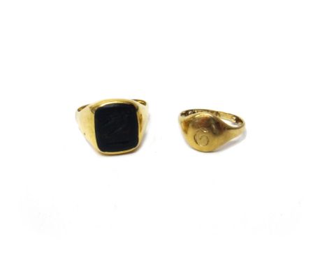 A gold and bloodstone set signet ring, crest engraved, detailed 18 CT, ring size O and a half (note arthritic bobbles) gross 